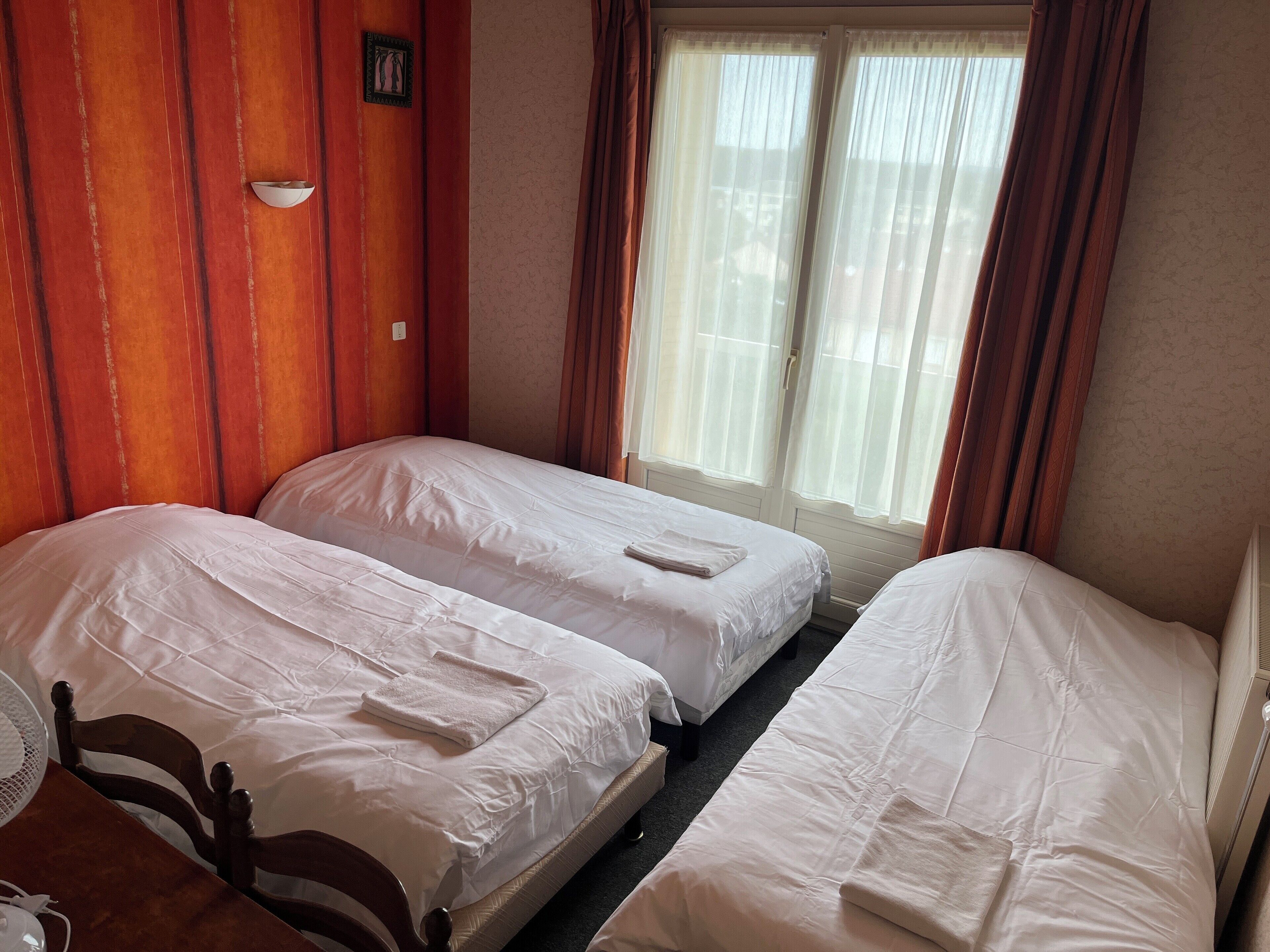triple room, 3 single beds | desk, laptop workspace, iron/ironing board, free cots/infant beds