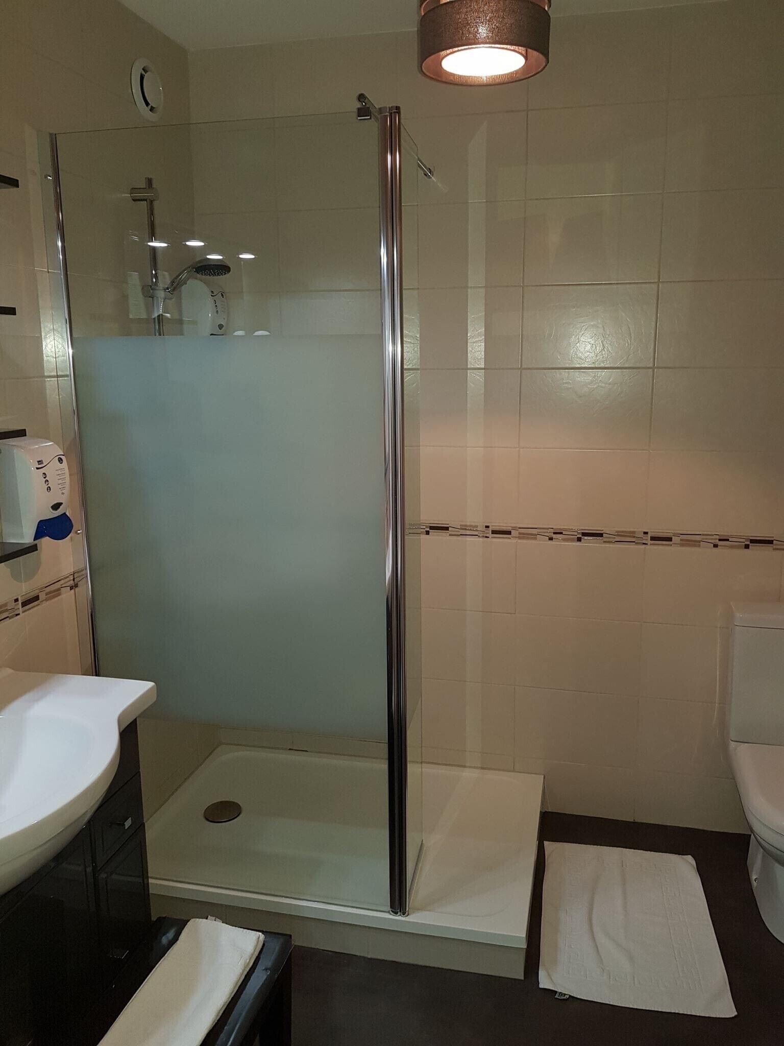 double room, 1 queen bed | bathroom | hair dryer, towels