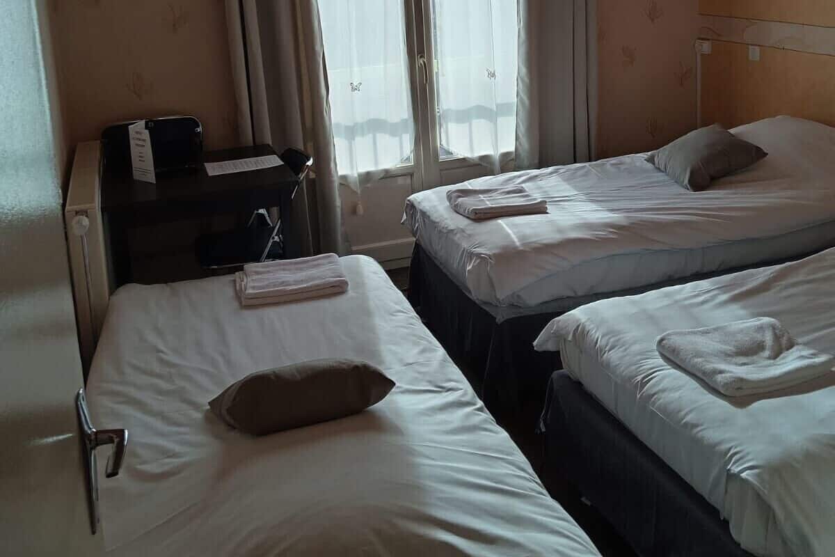 Triple Room, 3 Twin Beds | Desk, laptop workspace, iron/ironing board, free cribs/infant beds