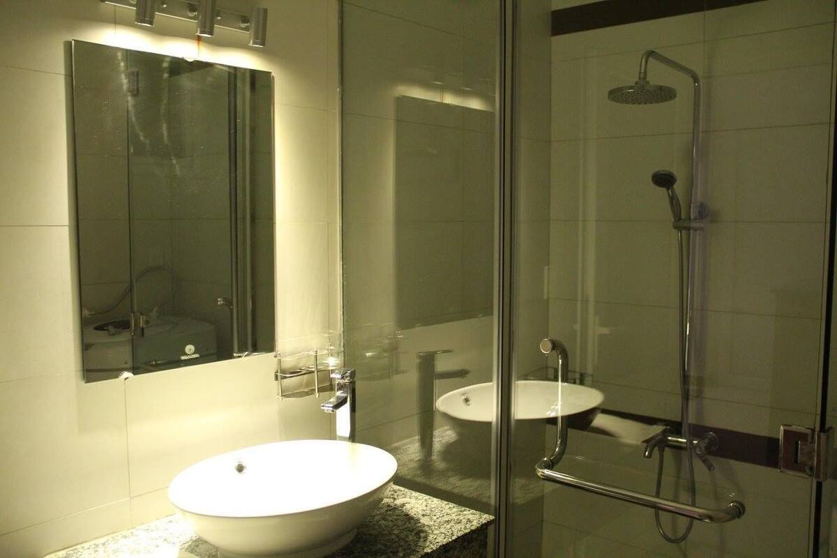 shower, free toiletries, hair dryer, dressing gowns