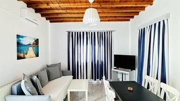 Superior Apartment, 1 Bedroom, Sea View | Living area | 32-inch flat-screen TV with digital channels, TV