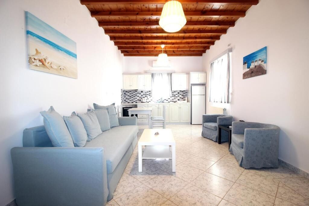 apartment, 2 bedrooms, sea view | living area | 32-inch flat-screen tv with digital channels, tv