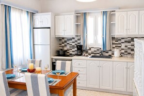 Departamento superior, 2 habitaciones | Cocina privada