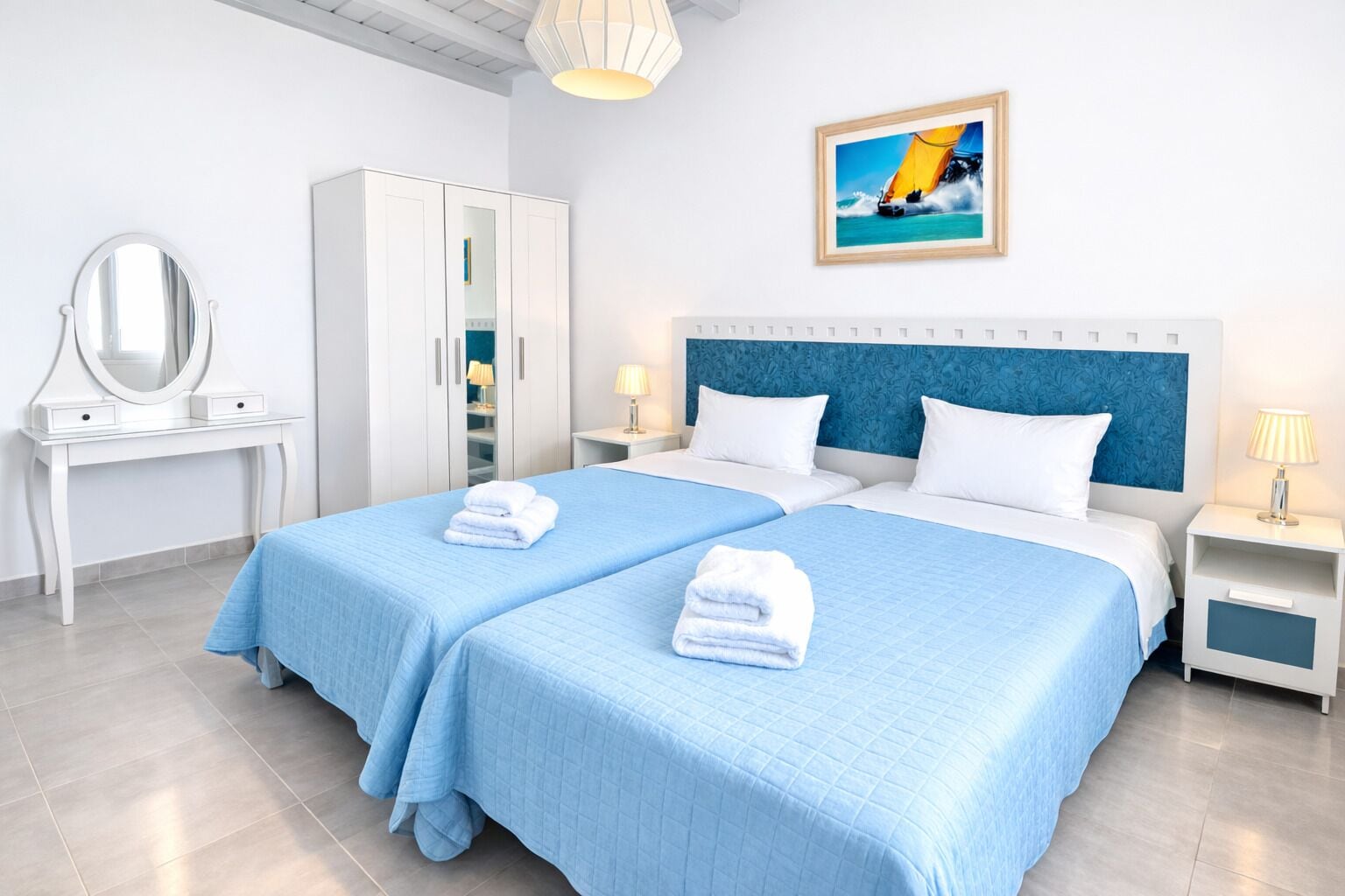 Apartment, 1 Bedroom, Sea View | Minibar, in-room safe, soundproofing, iron/ironing board