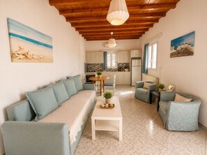 Apartment, 2 Bedrooms, Sea View | Living area | 32-inch flat-screen TV with digital channels, TV - Villa Oceania (Mykonos)