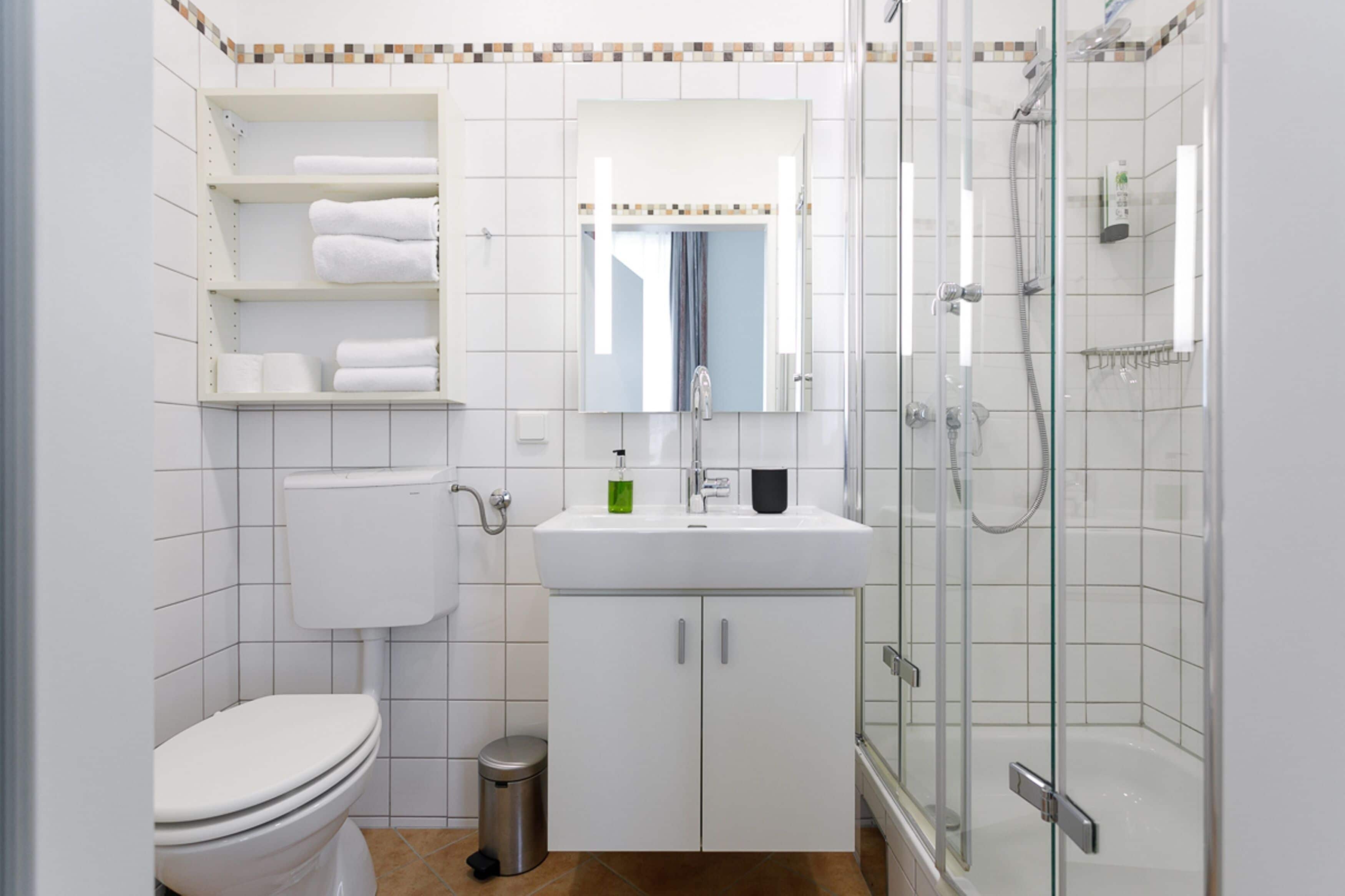 shower, free toiletries, hair dryer, towels