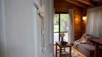 Ferienhütte | Wohnbereich | Flachbildfernseher, Kamin