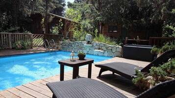 Outdoor pool, pool umbrellas, sun loungers