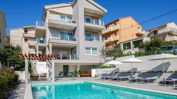 Outdoor pool, open 8:30 AM to 10:00 PM, pool umbrellas, pool loungers