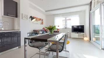 Family Apartment, 2 Bedrooms, Terrace, Pool View | Living area | Flat-screen TV