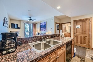 Condo, 1 Bedroom | Private kitchen | Full-size fridge, microwave, oven, dishwasher