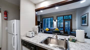 Condo, 2 Bedrooms | Private kitchen | Fridge, microwave, oven, dishwasher