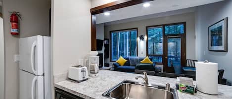 Condo, 2 Bedrooms | Private kitchen | Fridge, microwave, oven, dishwasher