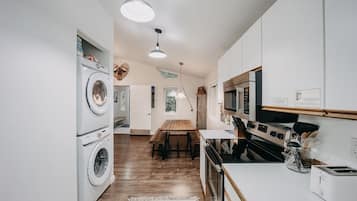 Cabin, 1 Bedroom | Private kitchen | Fridge, oven, coffee/tea maker, toaster