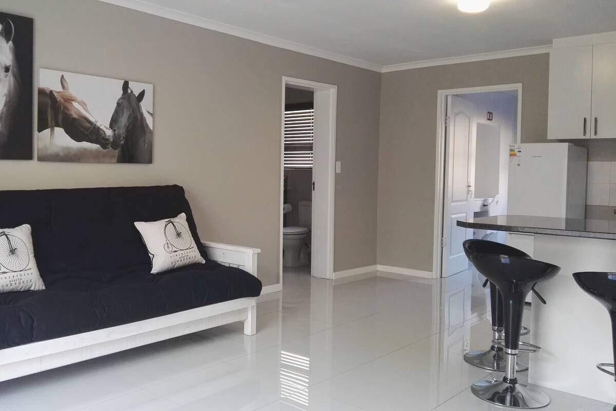 Apartment with view | Living area | Flat-screen TV