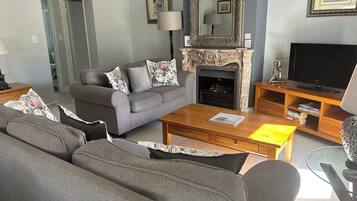 Lemon Tree Cottage | Living area | 44-inch flat-screen TV with satellite channels, LCD TV