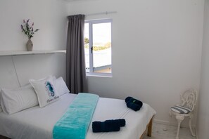 Familienapartment, 2 Schlafzimmer, Balkon | 2 Schlafzimmer, Bettwäsche aus ägyptischer Baumwolle