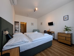 Superior Double Room, City View | Living area | 60-cm TV with satellite channels - Hotel Legie (Prague)