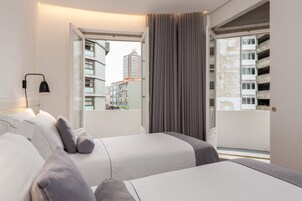 Premium Apartment, 4 Bedrooms (Bacchus Townhouse) | Premium bedding, pillowtop beds, individually decorated