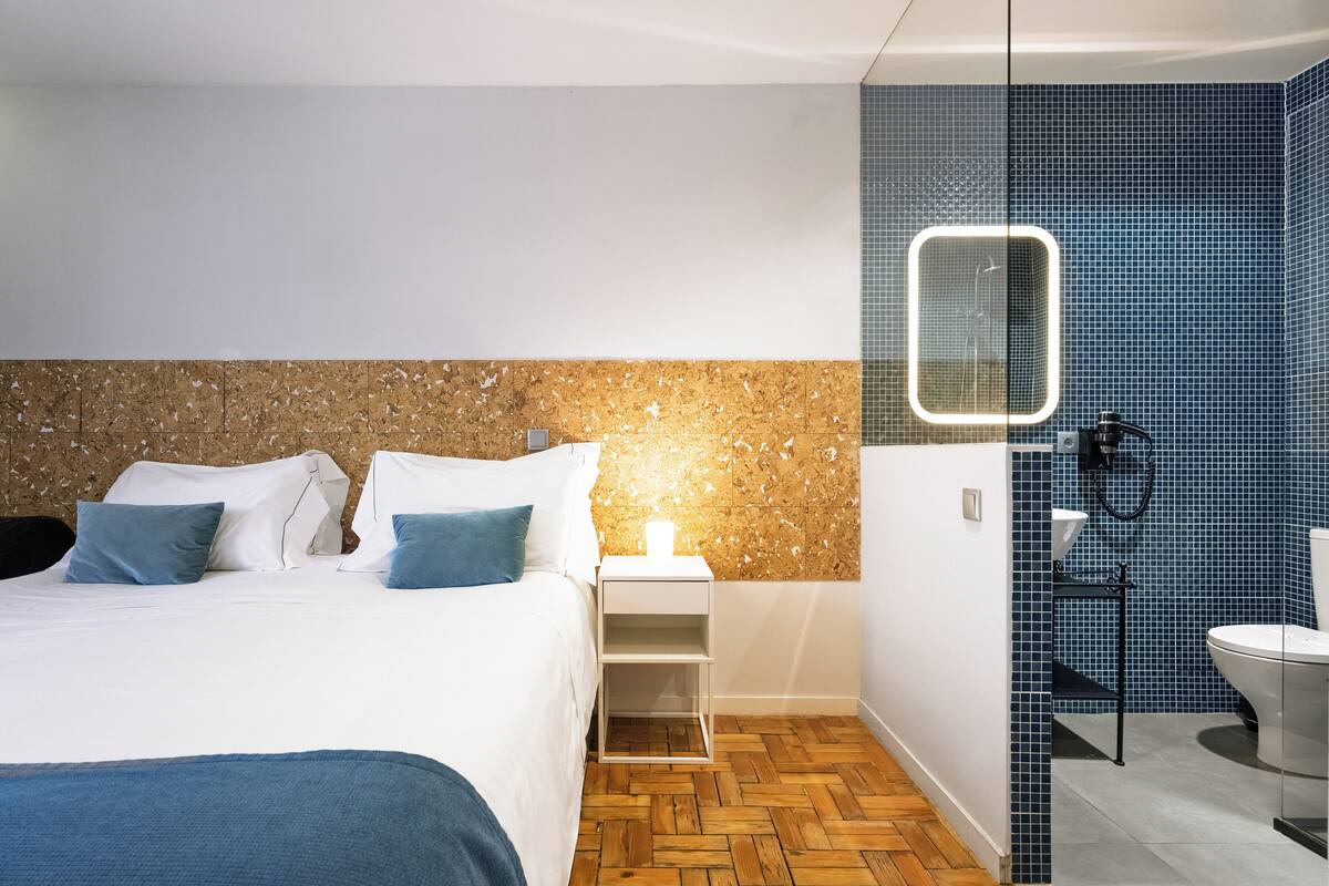 Departamento Premium, 5 habitaciones (DOC Townhouse) | Ropa de cama de alta calidad, camas con pillow-top y cortinas blackout