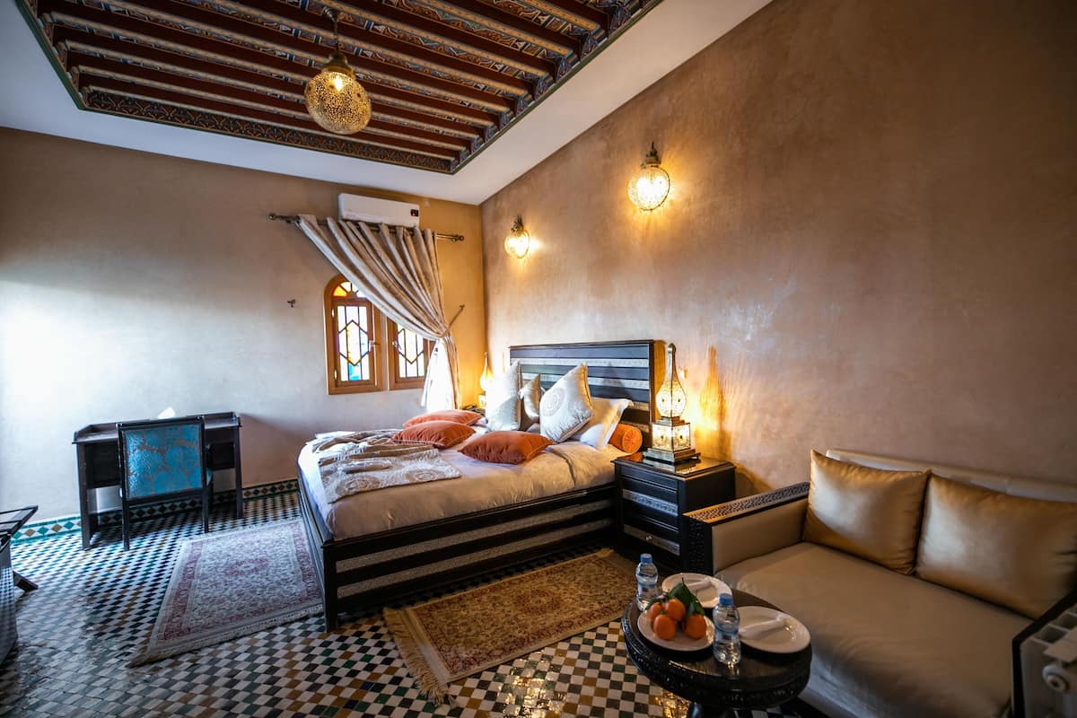 Superior Suite, 1 King Bed, Private Bathroom | Premium bedding, minibar, in-room safe, blackout drapes