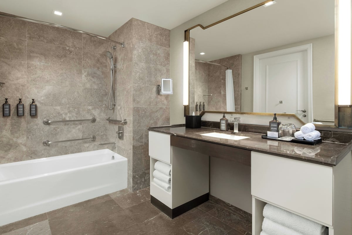 Shower, rainfall showerhead, free toiletries, hair dryer