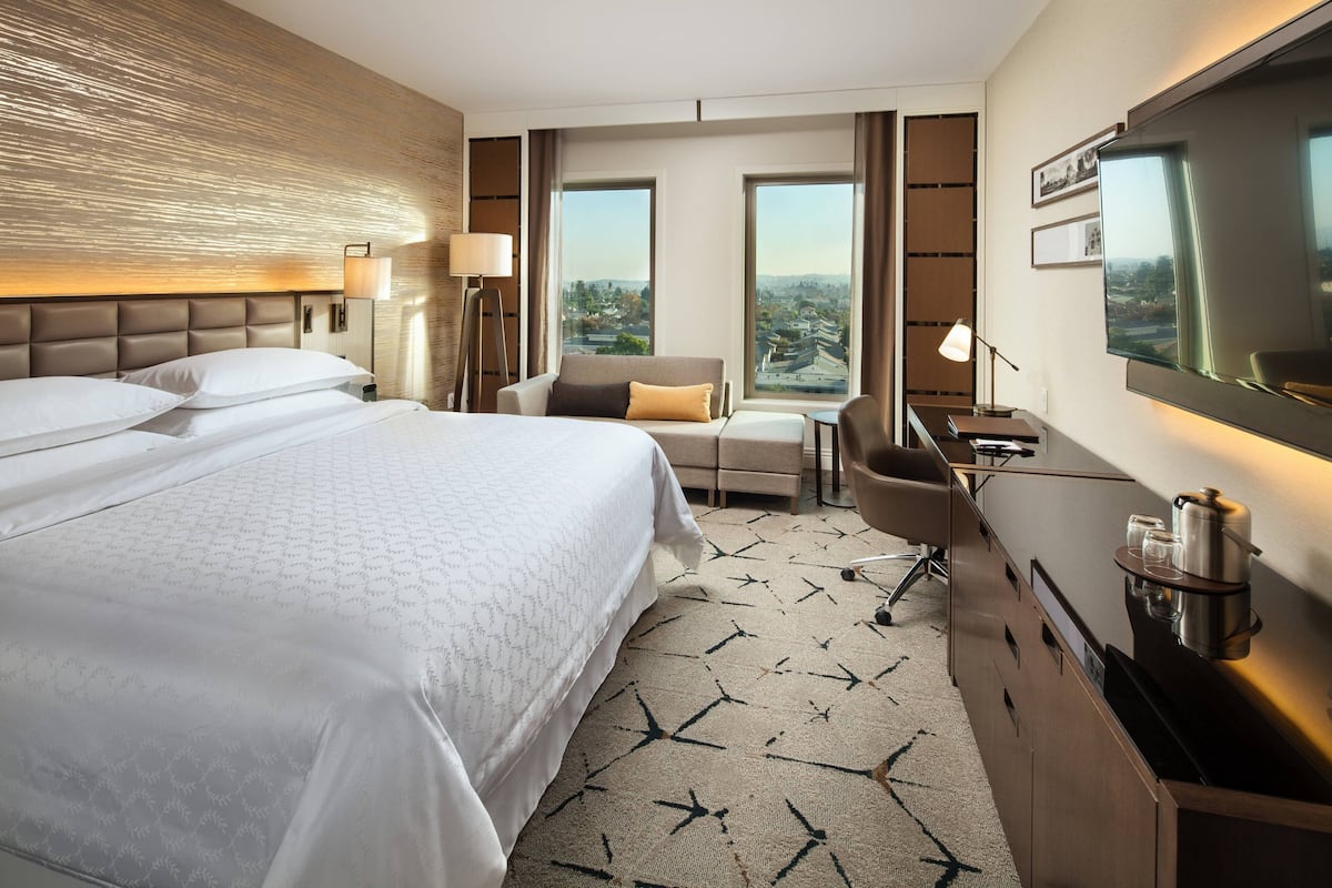 Premium bedding, down duvets, in-room safe, desk