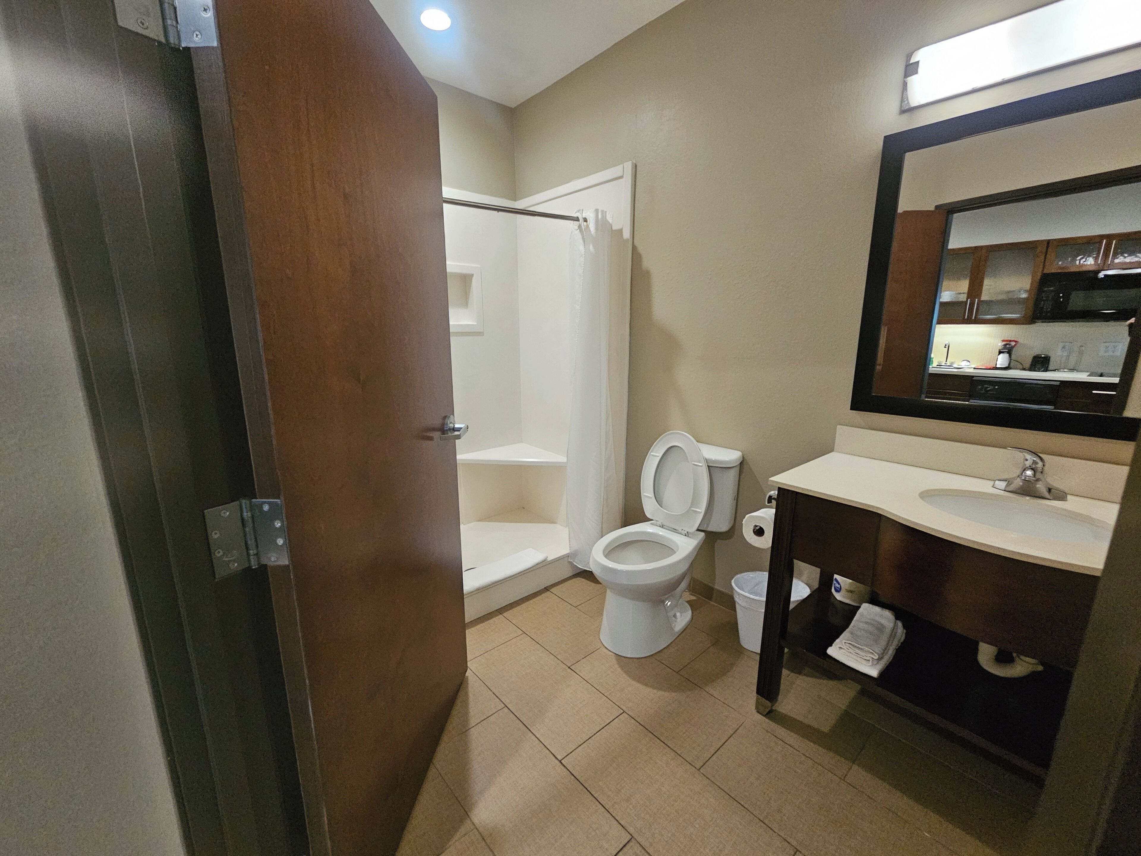 suite, 1 king bed | bathroom | shower, free toiletries, hair dryer, towels