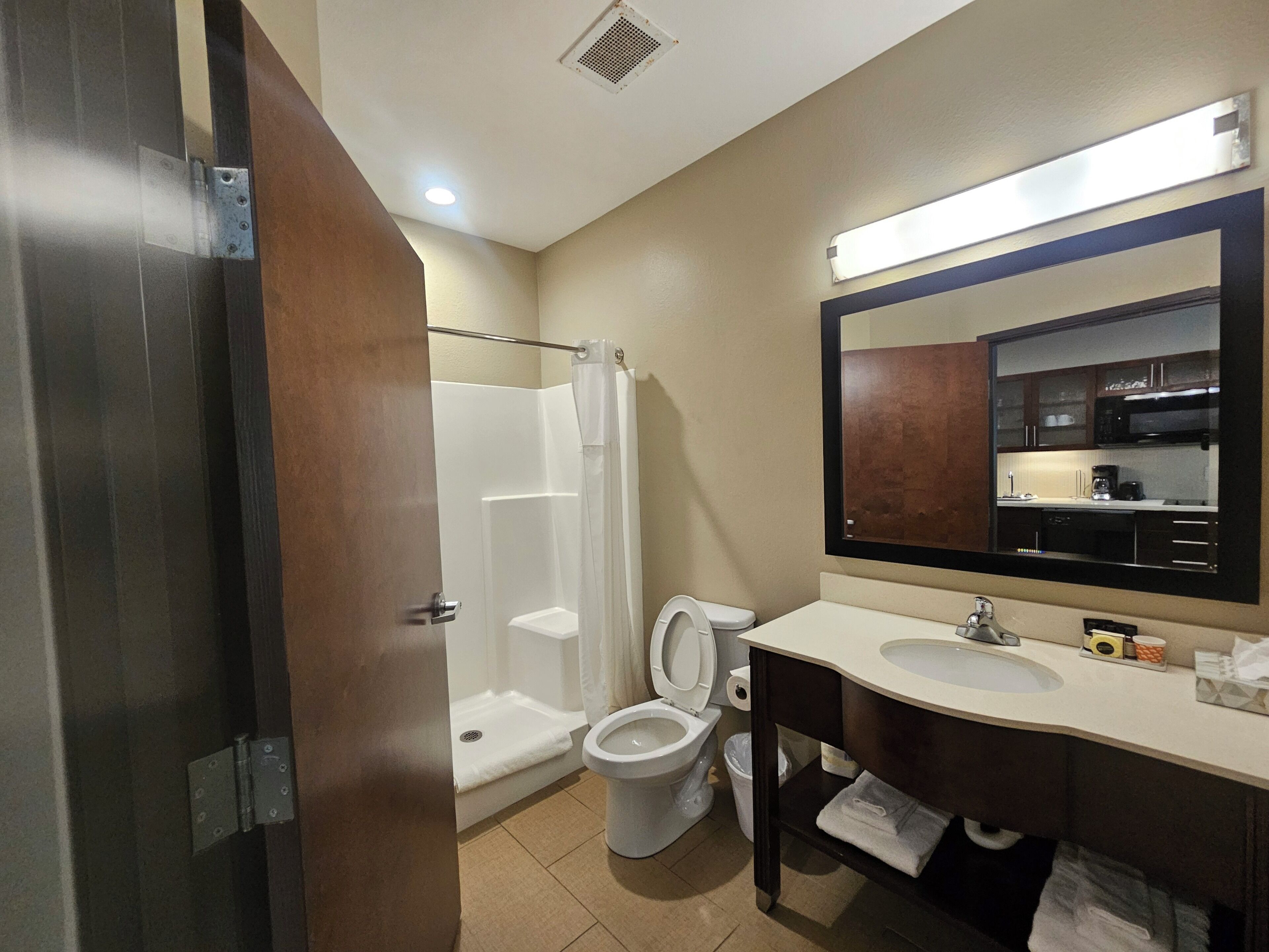 shower, free toiletries, hair dryer, towels