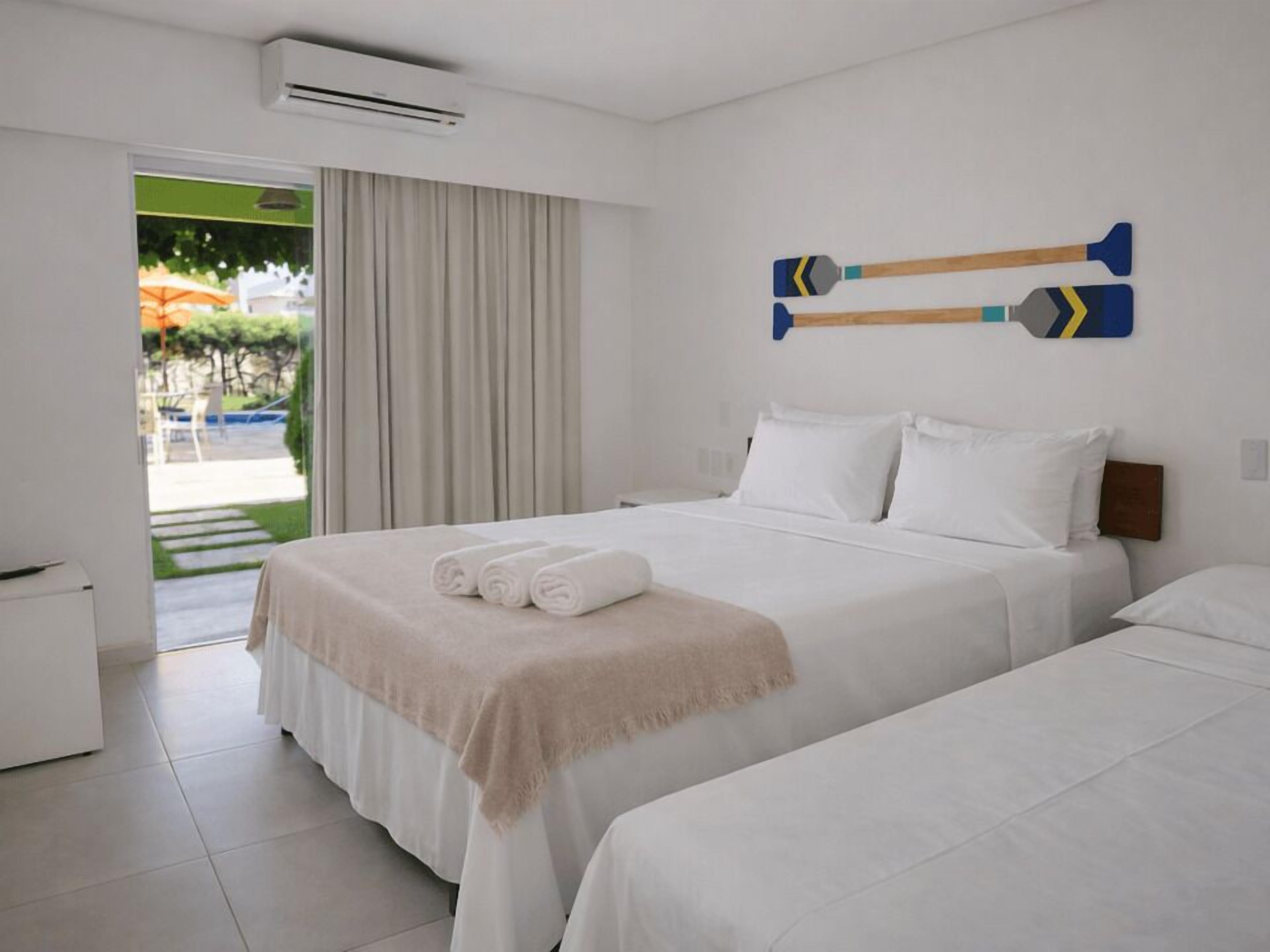 Superior Quadruple Room | Minibar, blackout drapes, free WiFi