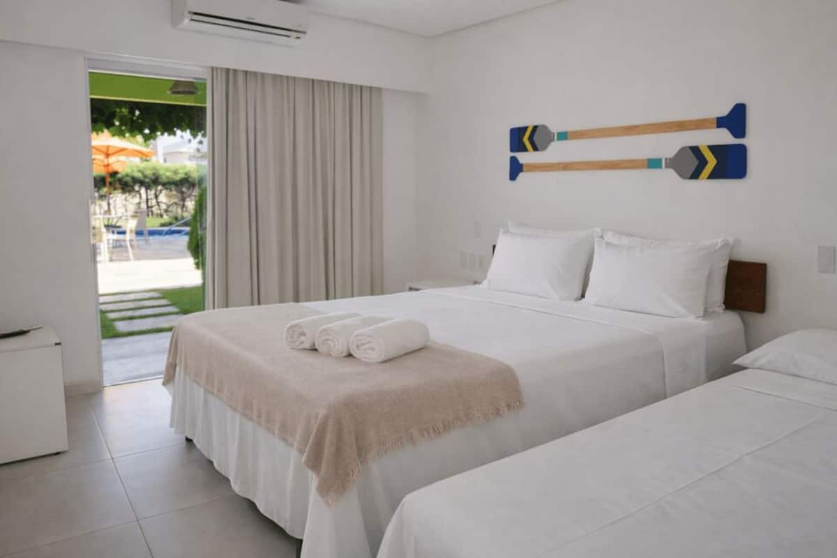 Superior Quadruple Room | Minibar, blackout drapes, free WiFi