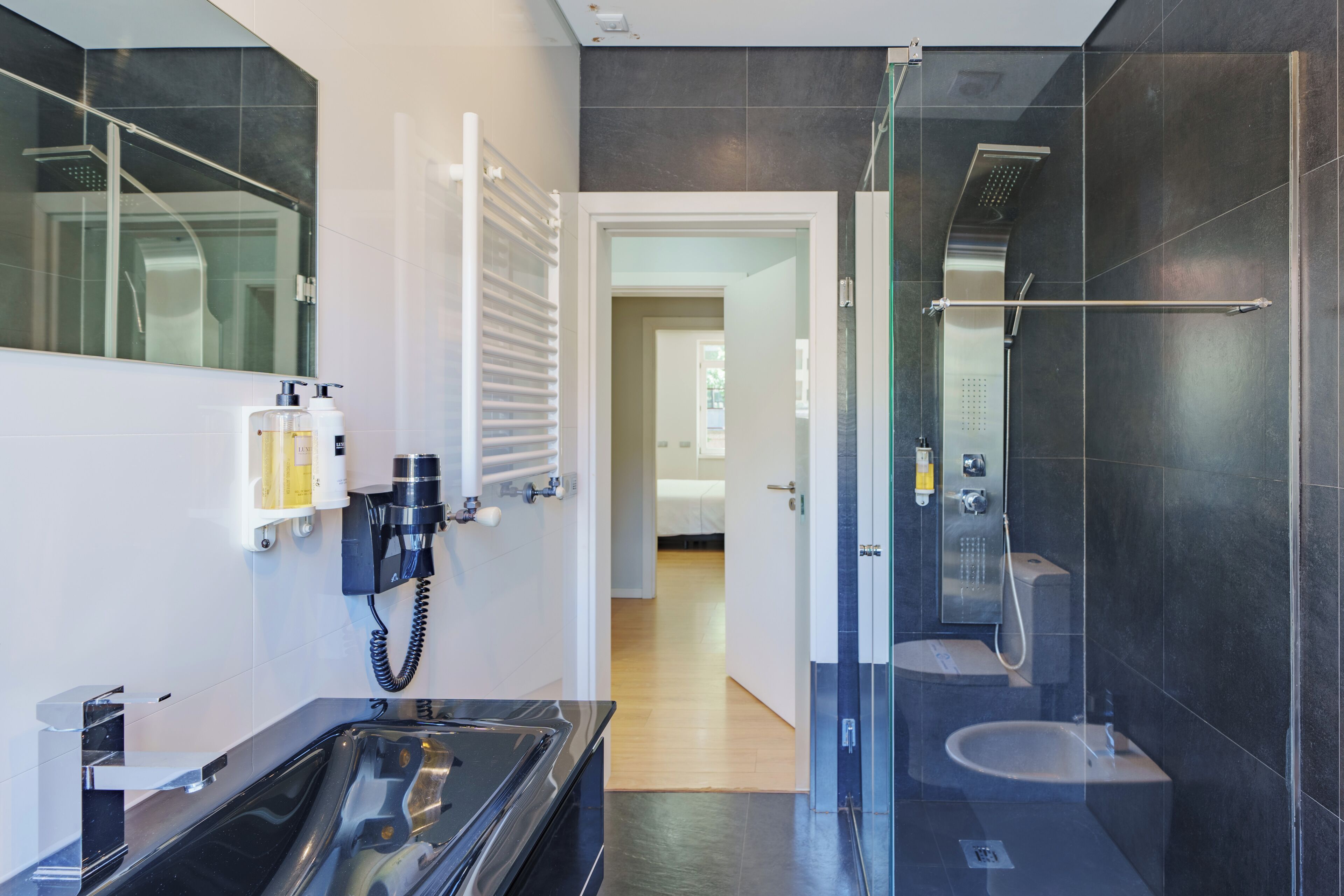 premium apartment, 3 bedrooms, city view (downtown essence) | bathroom | shower, hair dryer, towels, shampoo