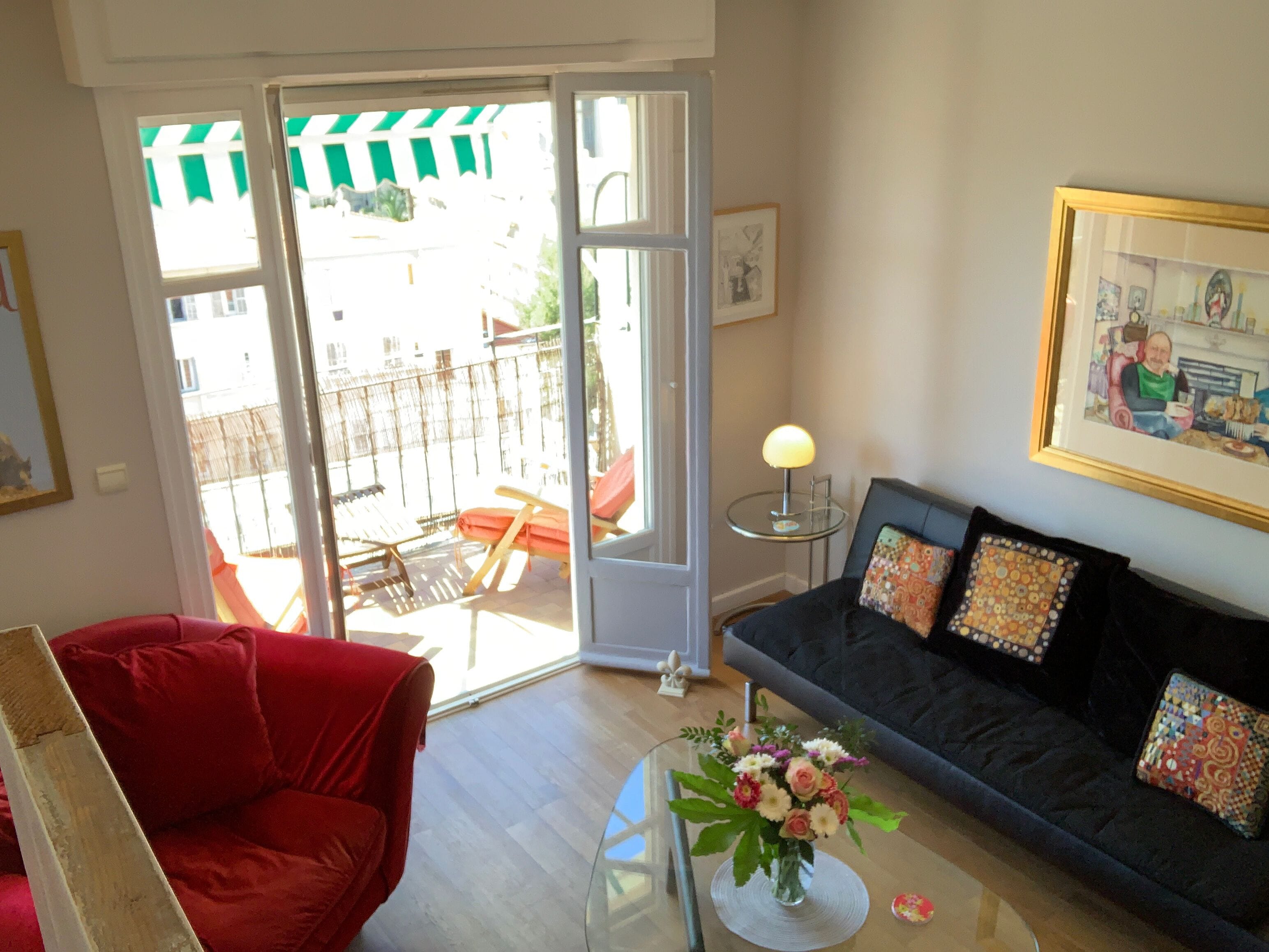 Flat-screen TV, DVD player, books, video library