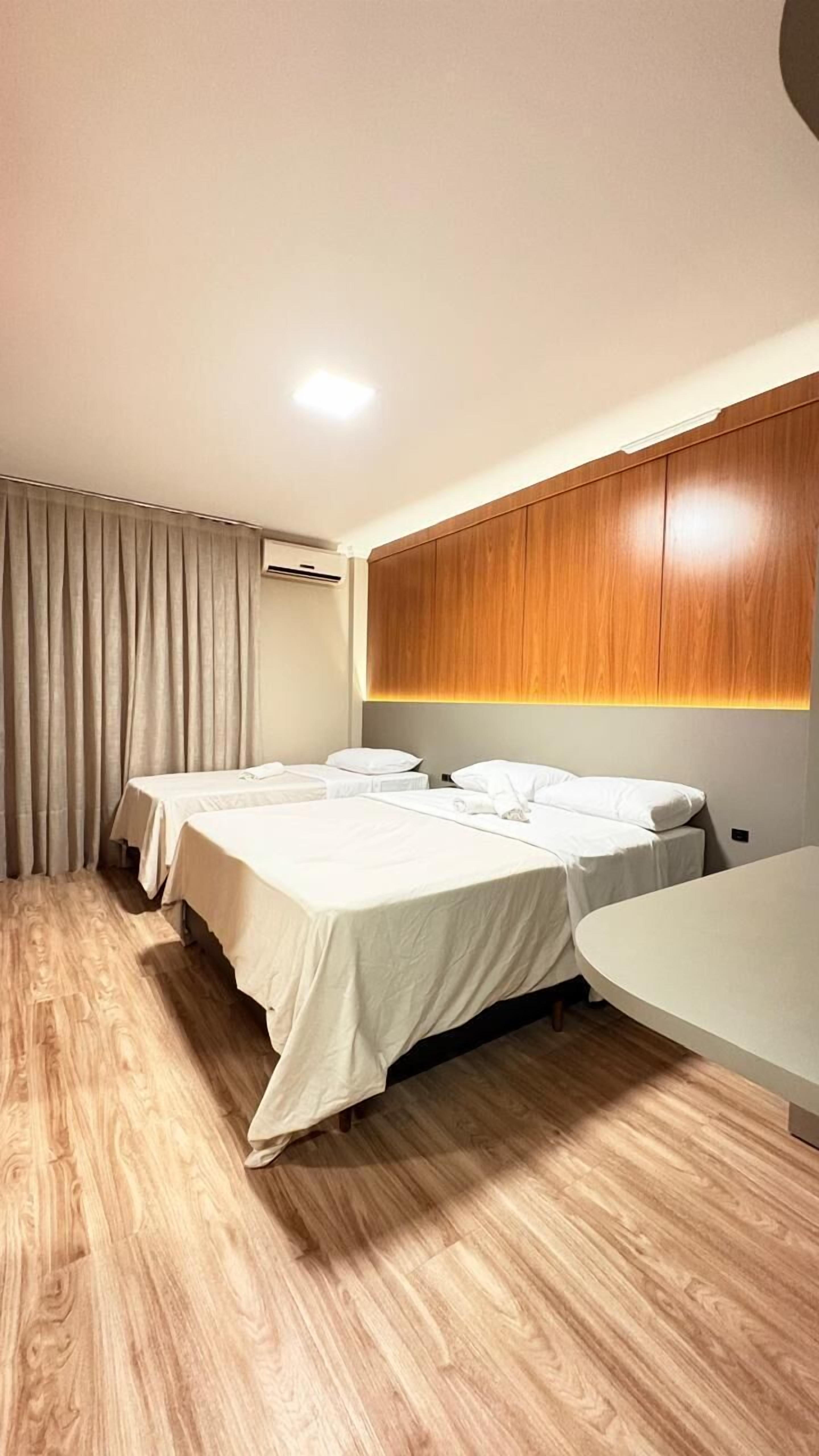 Comfort Triple Room | Minibar, laptop workspace, blackout drapes, free WiFi