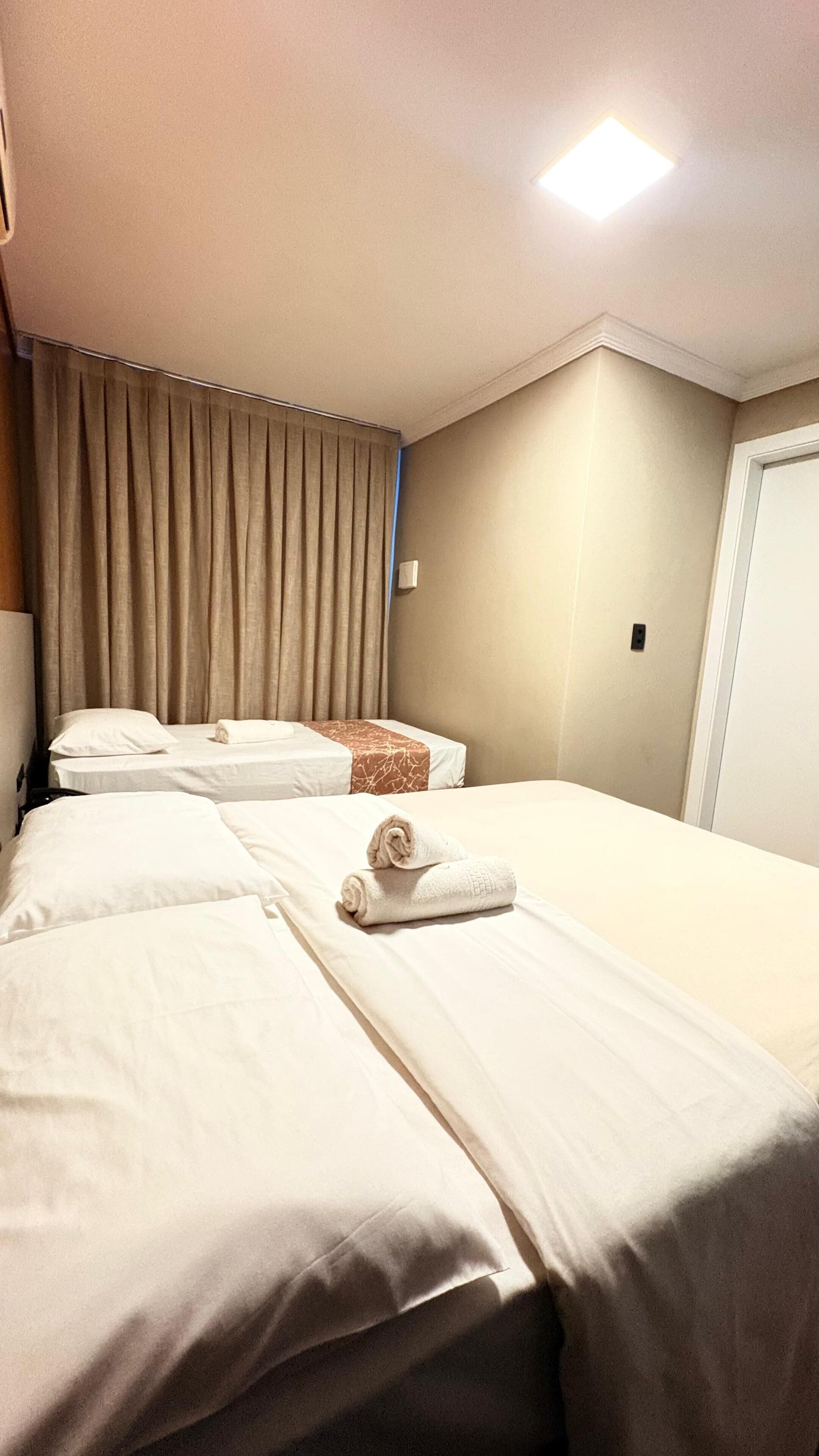 Standard Triple Room | Minibar, laptop workspace, blackout drapes, free WiFi