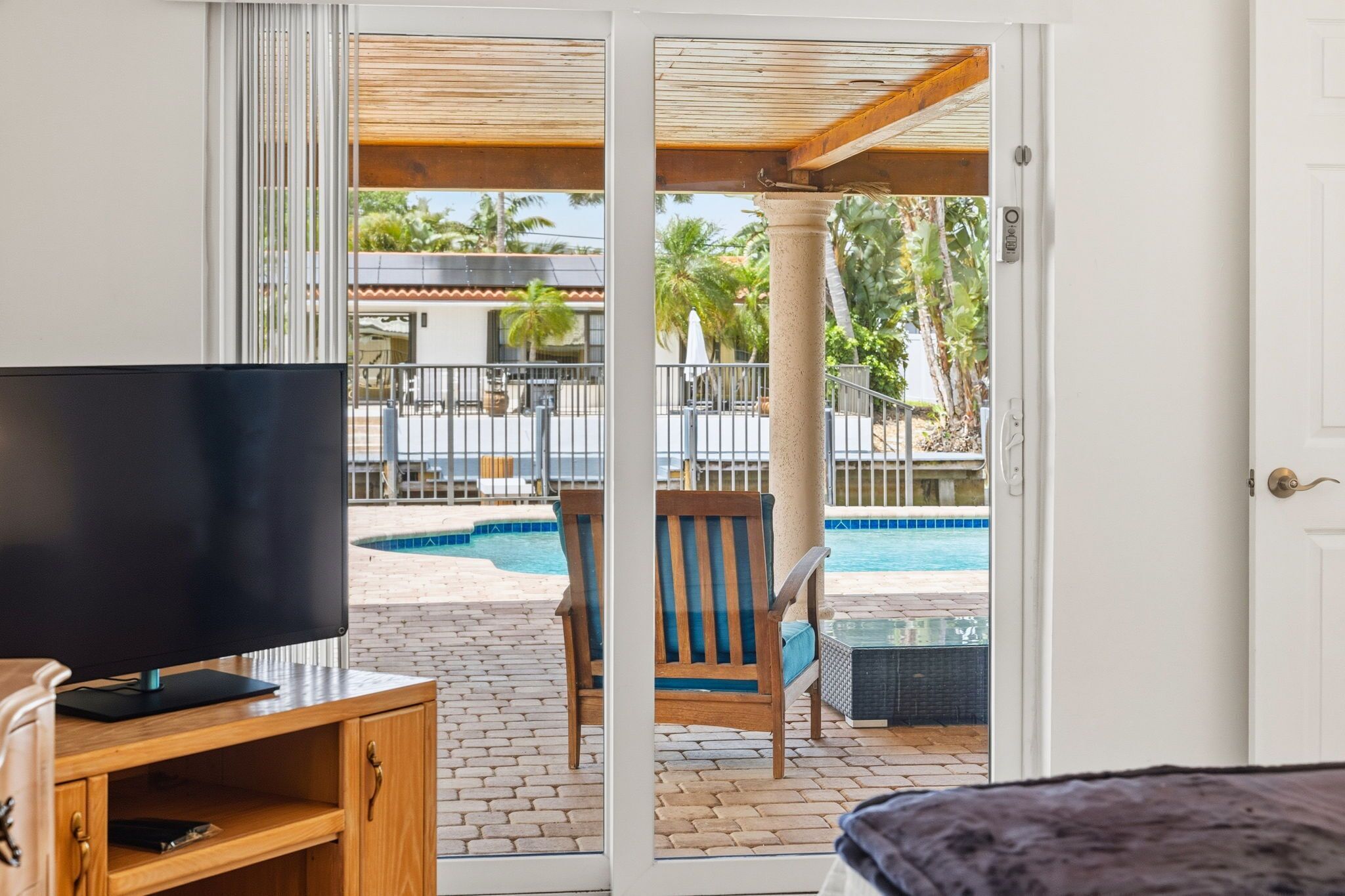 King suite with original art, serene coastal vibe and luxe comfort.