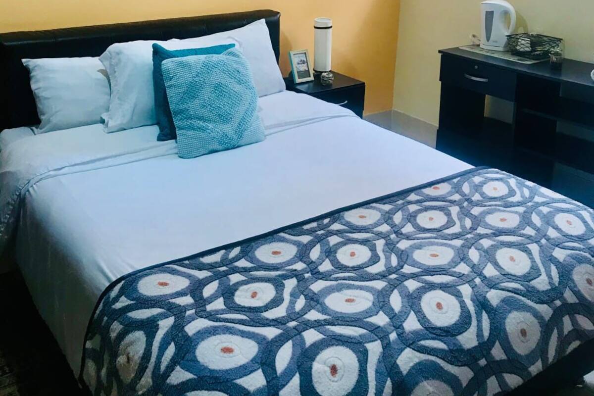 Economy Double Room, 1 Large Twin Bed, Private Bathroom, Tower | 1 bedroom, down comforters, desk, iron/ironing board (on request)