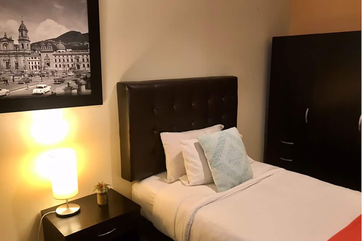 Economy Single Room, 1 Twin Bed, Shared Bathroom, Courtyard Area | 1 bedroom, down comforters, desk, iron/ironing board (on request)
