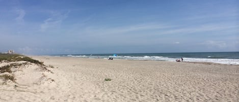 On the beach, sun-loungers, beach towels