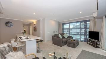 Penthouse, 1 Bedroom | Living area | Flat-screen TV, Netflix, iPod dock