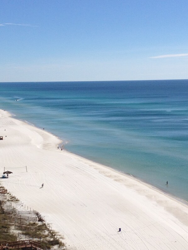 On the beach, sun-loungers