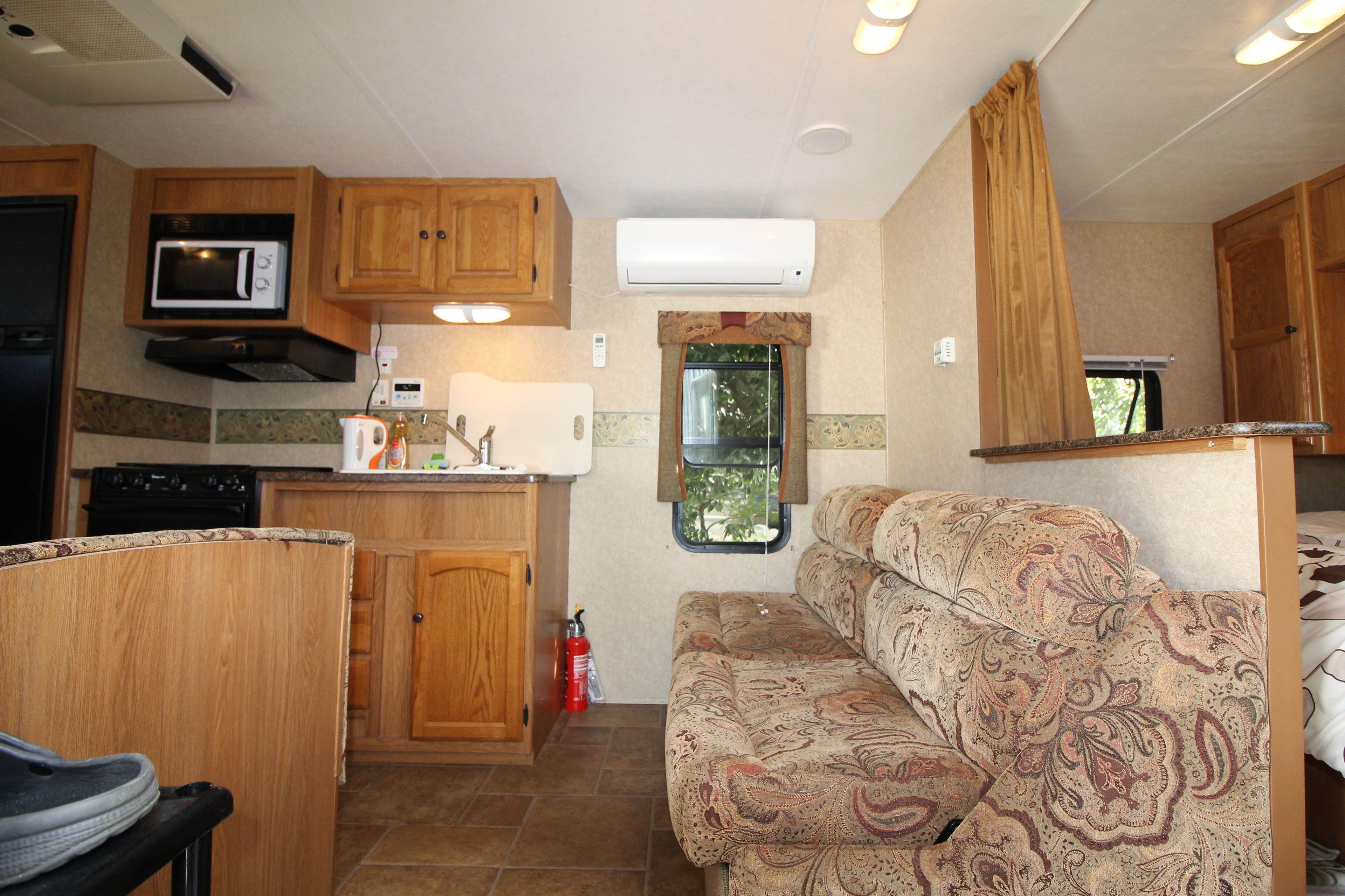 caravan | living area | flat-screen tv