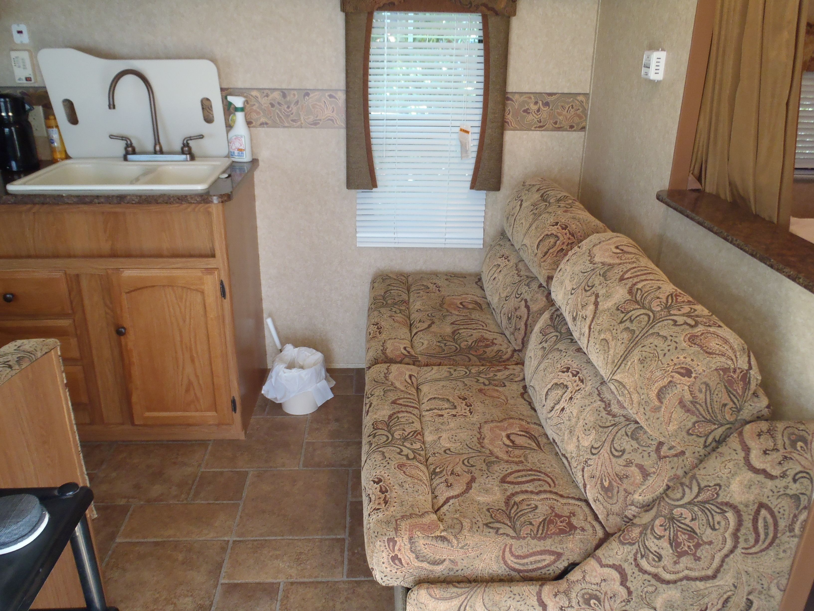 caravan | living area | flat-screen tv