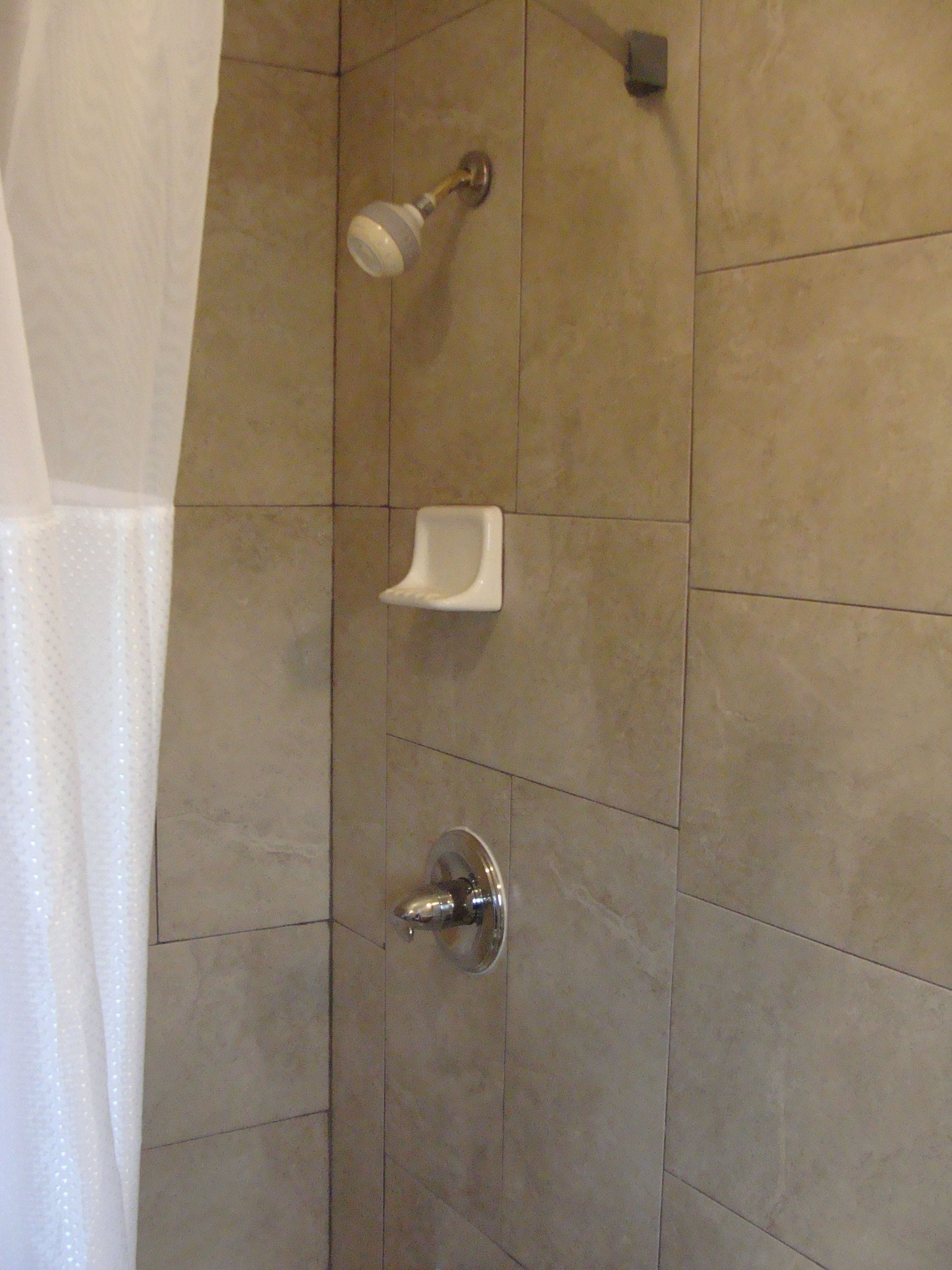 Standard Room, 1 King Bed, Refrigerator & Microwave | Bathroom shower