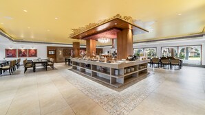 A spacious lobby with a central bar area, multiple seating arrangements, and a decorative ceiling. - Gateway Kandla Gandhidham (Anjar)