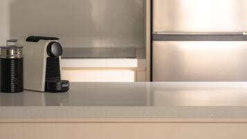 Full-sized fridge, microwave, stovetop, espresso maker