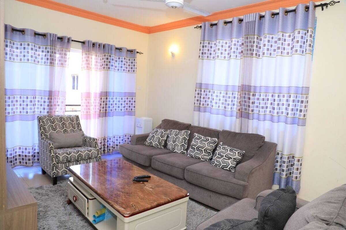 Business Apartment | Living area | Flat-screen TV