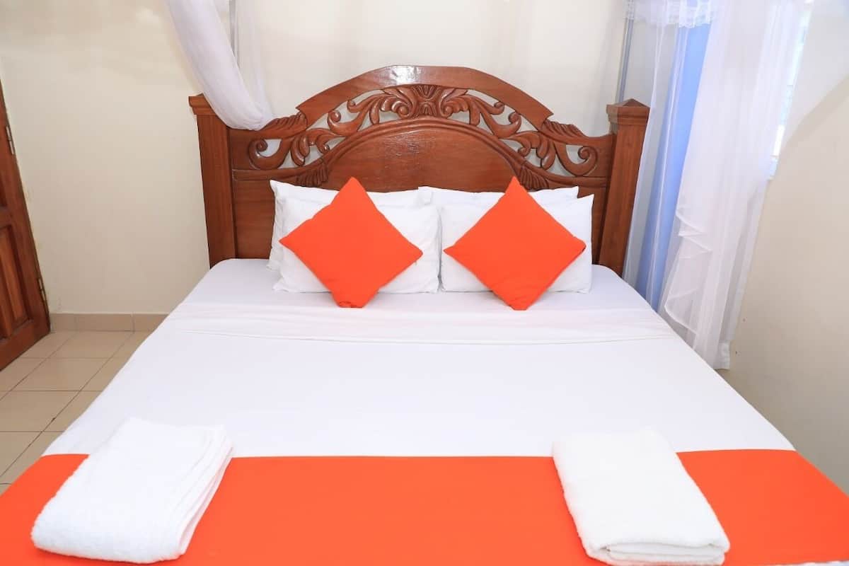 Economy Apartment, 3 Bedrooms, Garden View | 3 bedrooms, laptop workspace, iron/ironing board, free WiFi