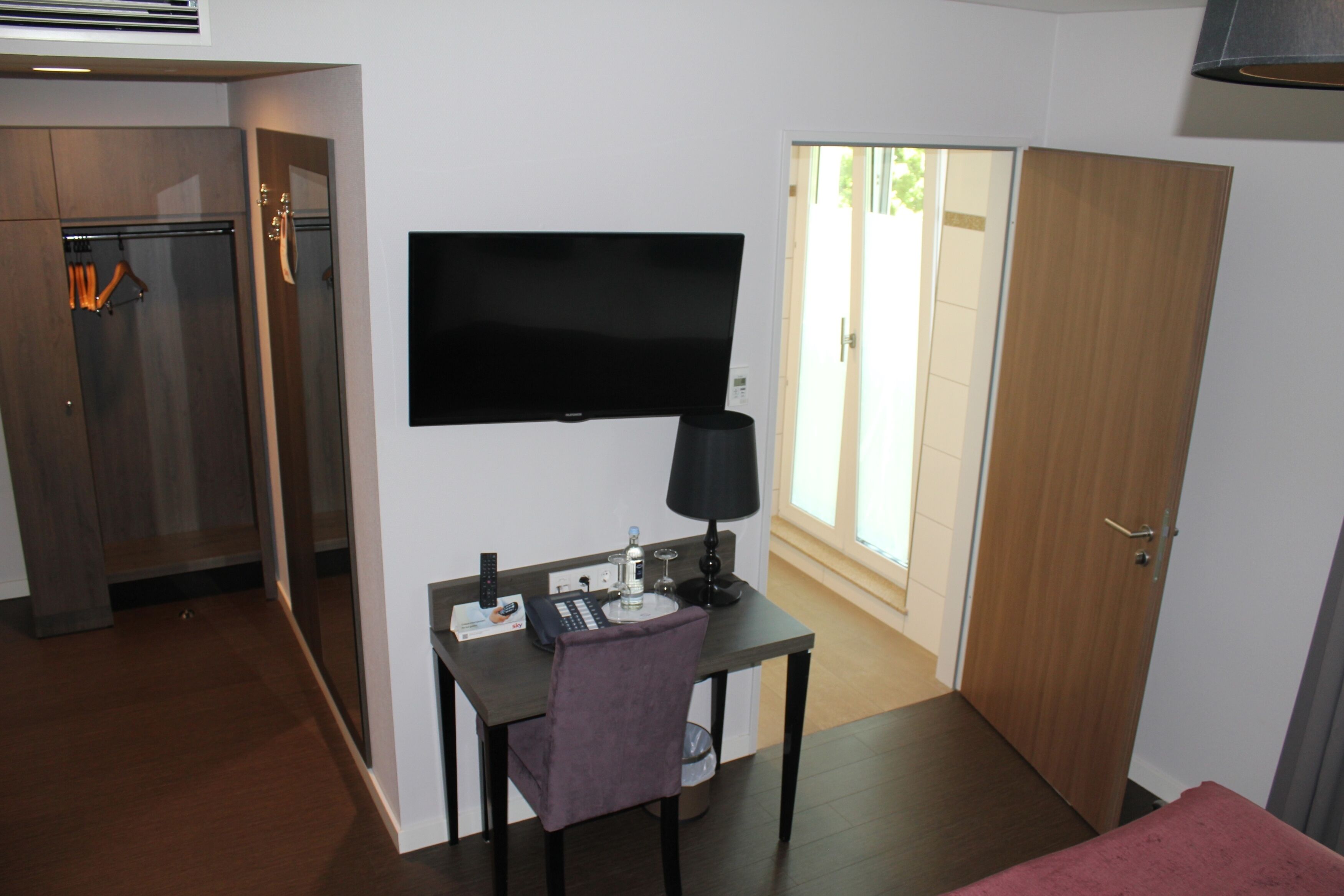 double room, accessible | living area | flat-screen tv