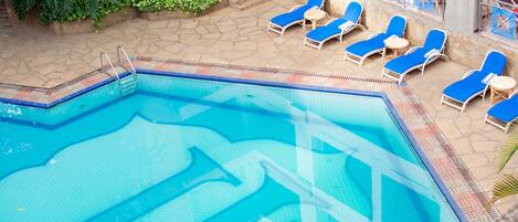 Outdoor pool, pool umbrellas, pool loungers
